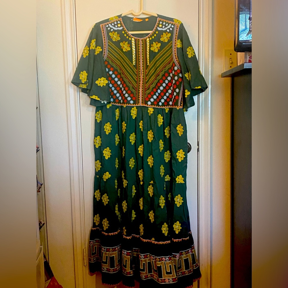 Flirty V’Neck MaxiLounge gown.